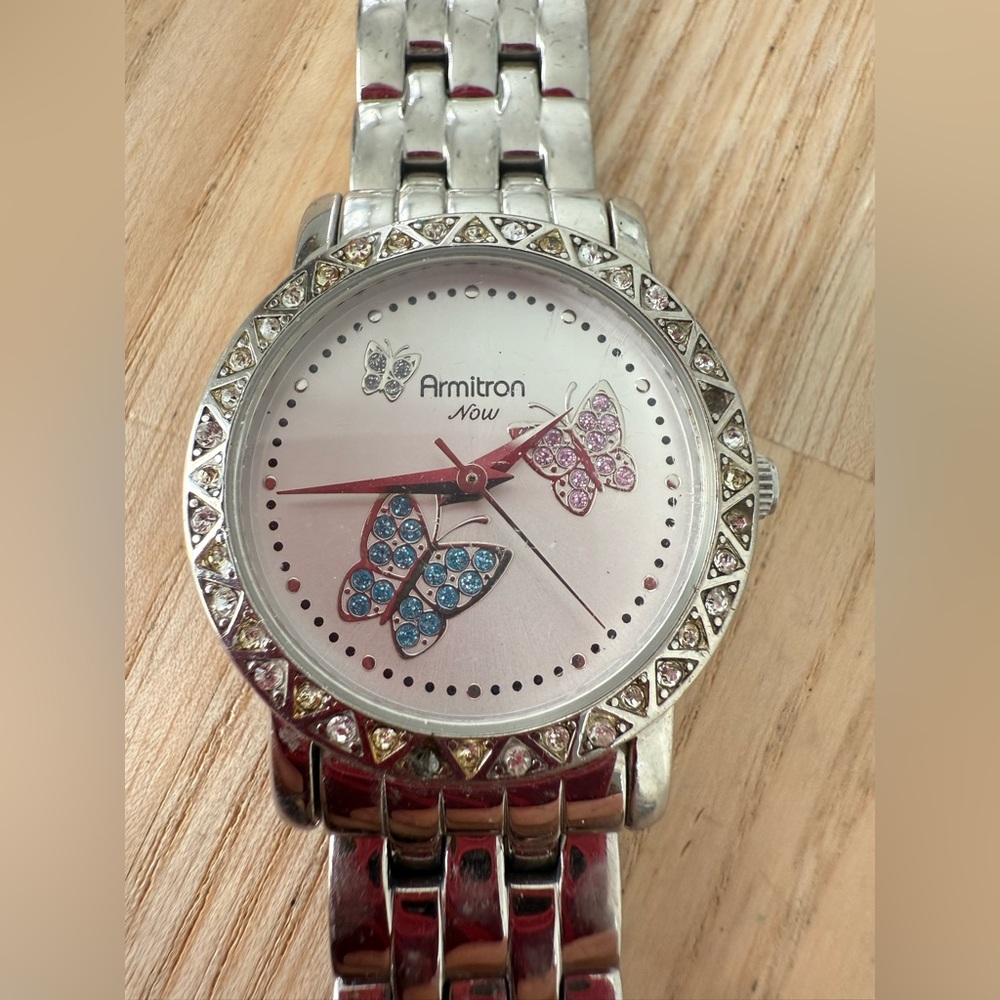 Armitron Now ladies butterfly silver tone watch NEW BATTERY